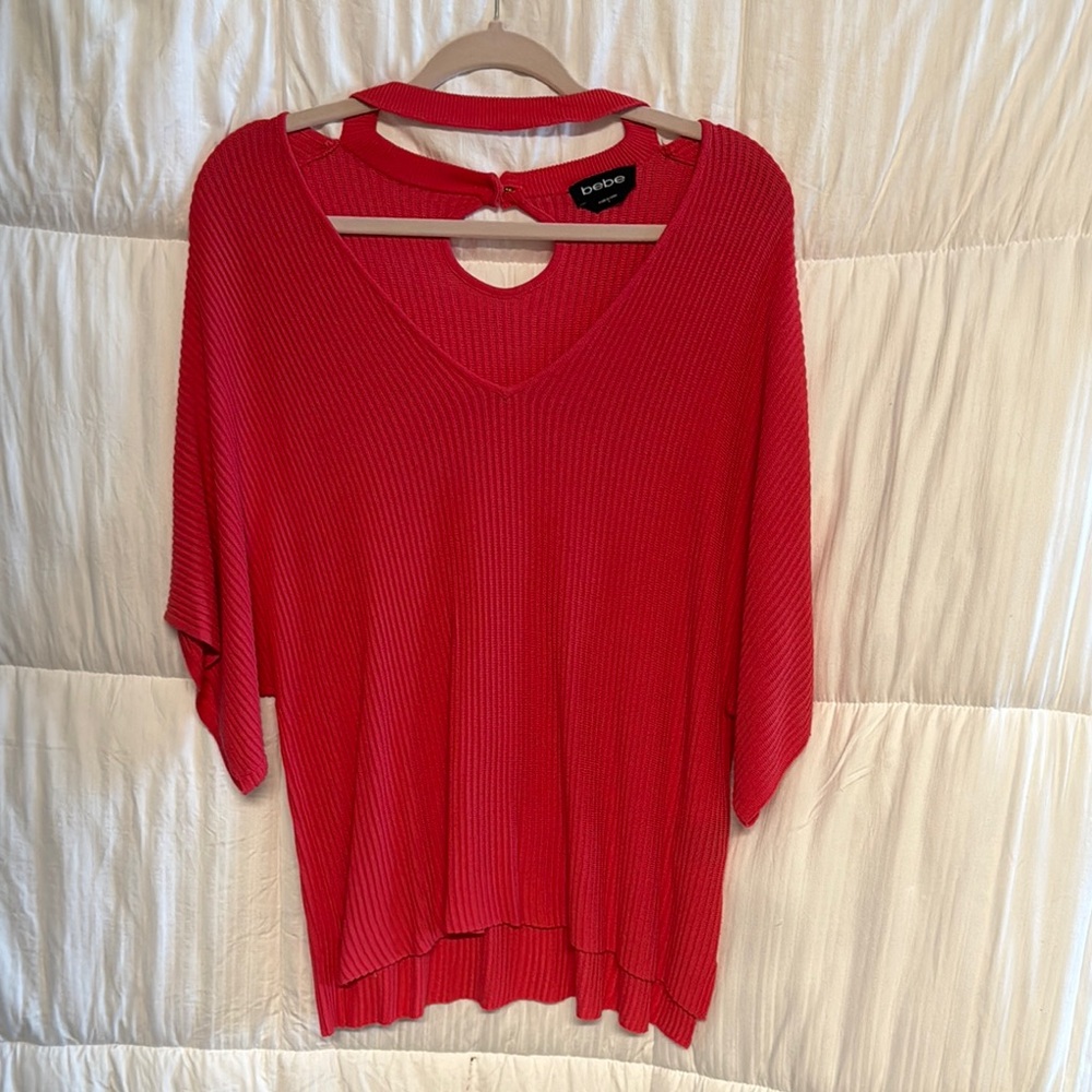 bebe Vibrant Coral Sweater with stylish neckline